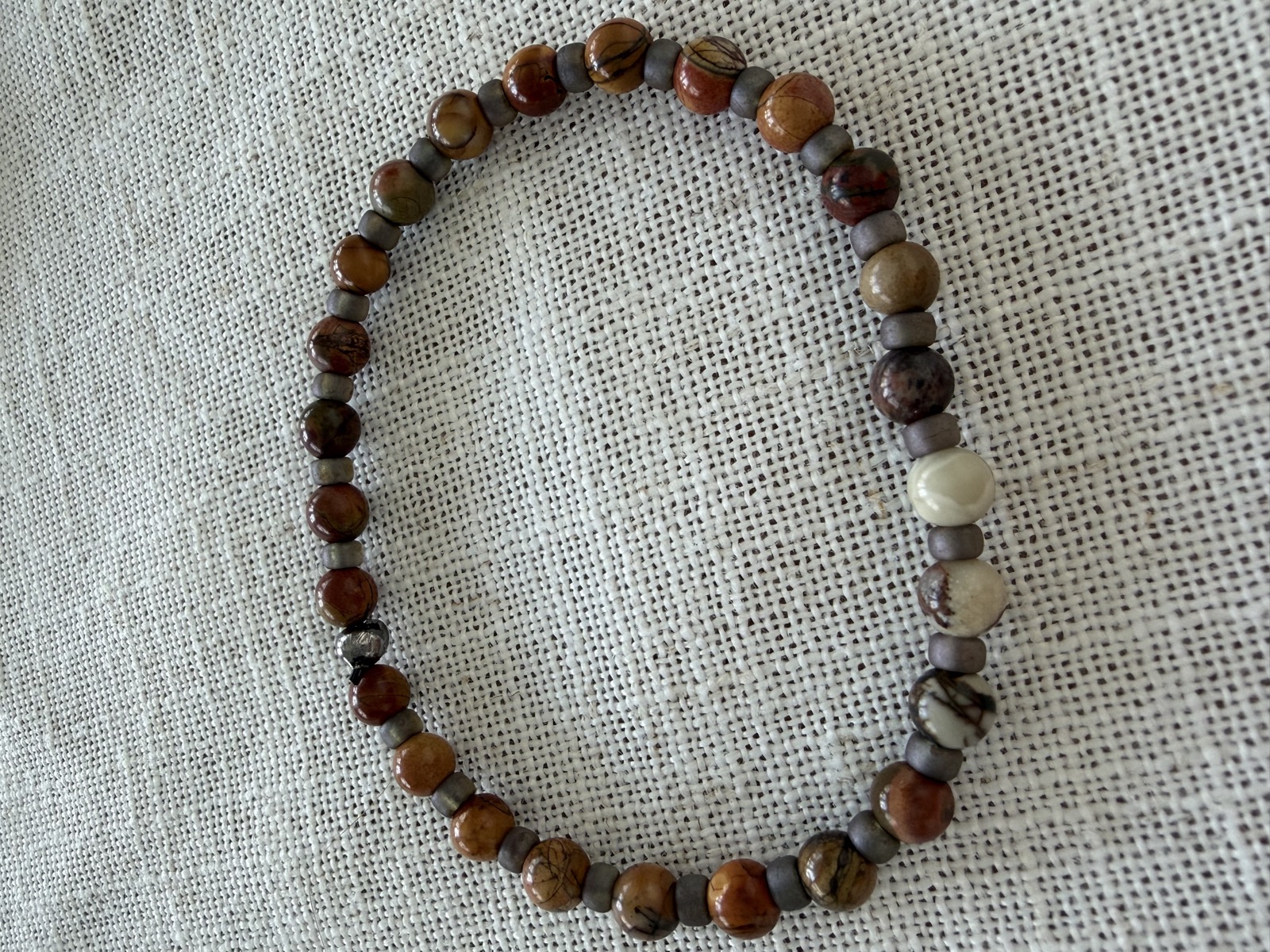 Jasper men's bracelet on linen