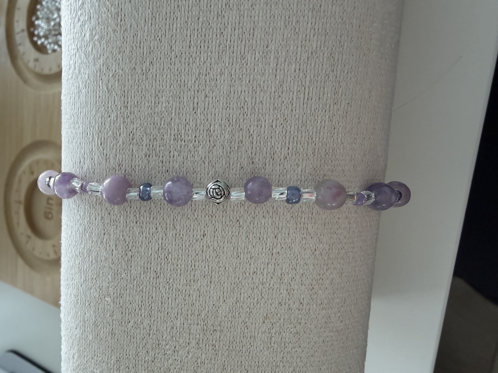 Amethyst bracelet with rose accent bead